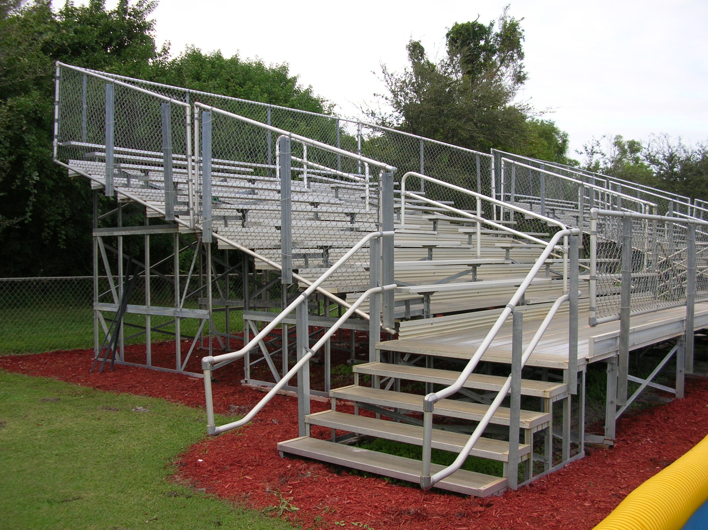 Elevated aluminum bleachers for a baseball field